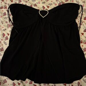 Chic Black Top with Heart Detail